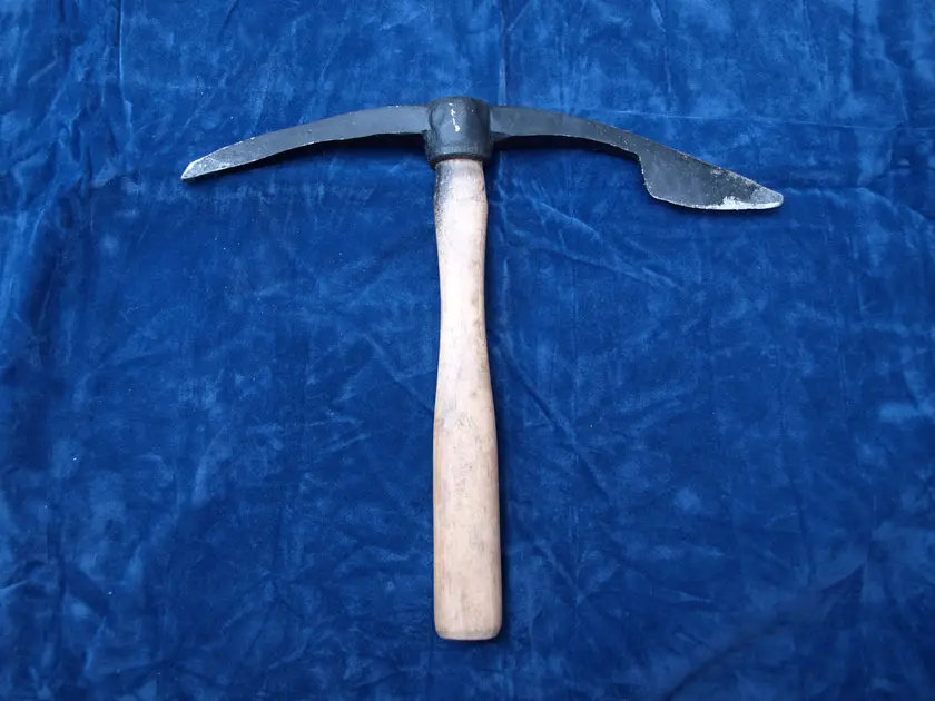 A twibill: a double-ended mortising tool on a central handle